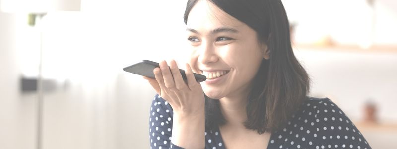 Virtual Assistant talking into phone in Vancouver